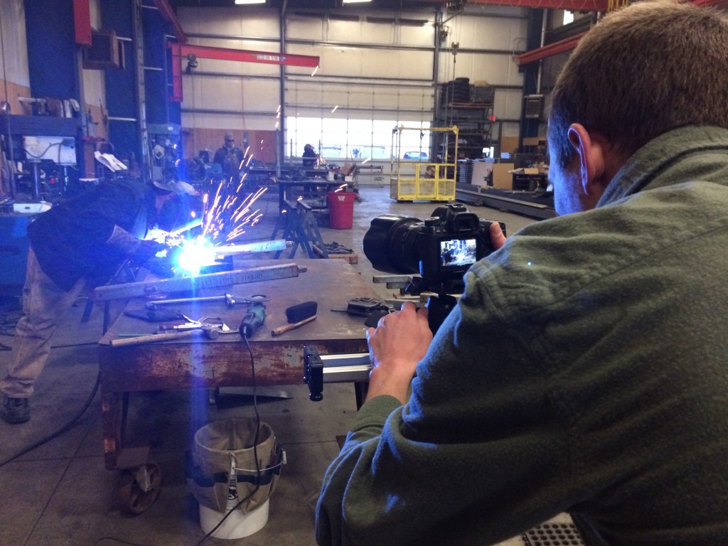 Kevin Jantzer shoots action shots of welding fabrication in White City 